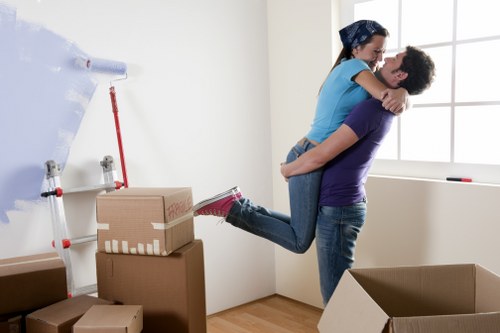 Packed office equipment and furniture ready for relocation in Harrow