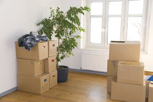 Same-day removals team loading furniture for a Harrow home move