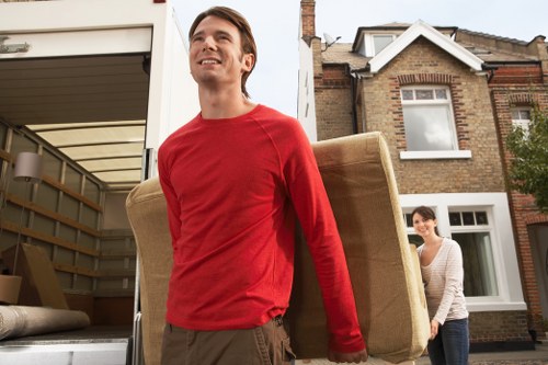 Careful furniture handling during a student move in Harrow