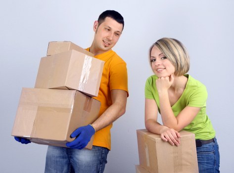 Prepared office boxes and workstation items ready for transport