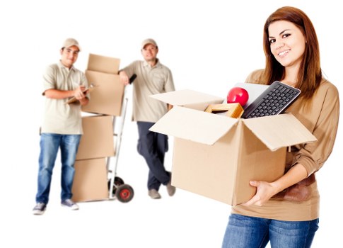 Removal team loading furniture from a Harrow property with care