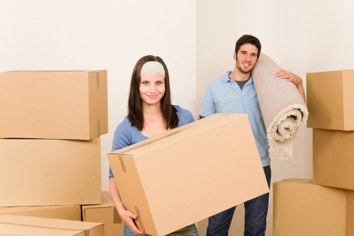 Business relocation process with boxes and office furniture in Harrow