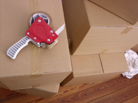Loading furniture into a van for a Harrow delivery
